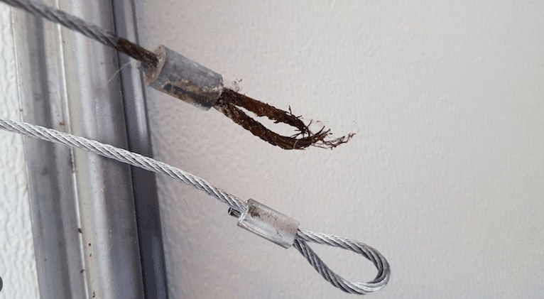 garage door broken cable repair 
